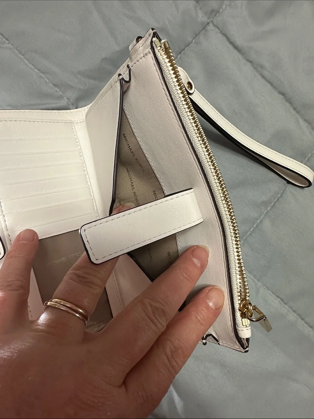 Michael Kors White Wristlet with Gold Floral Accents